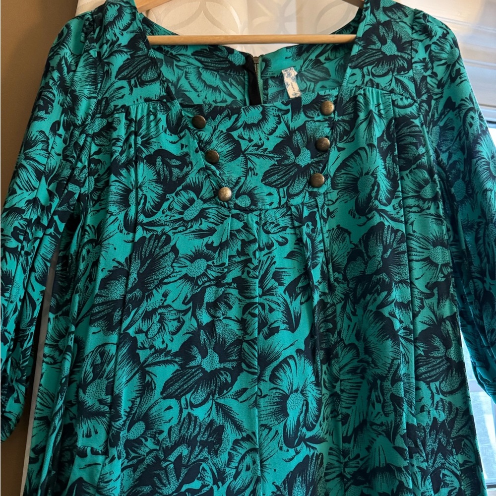 Cute shirt dress. Anthro. Short. Not form fitting. With boots cute. Any season.